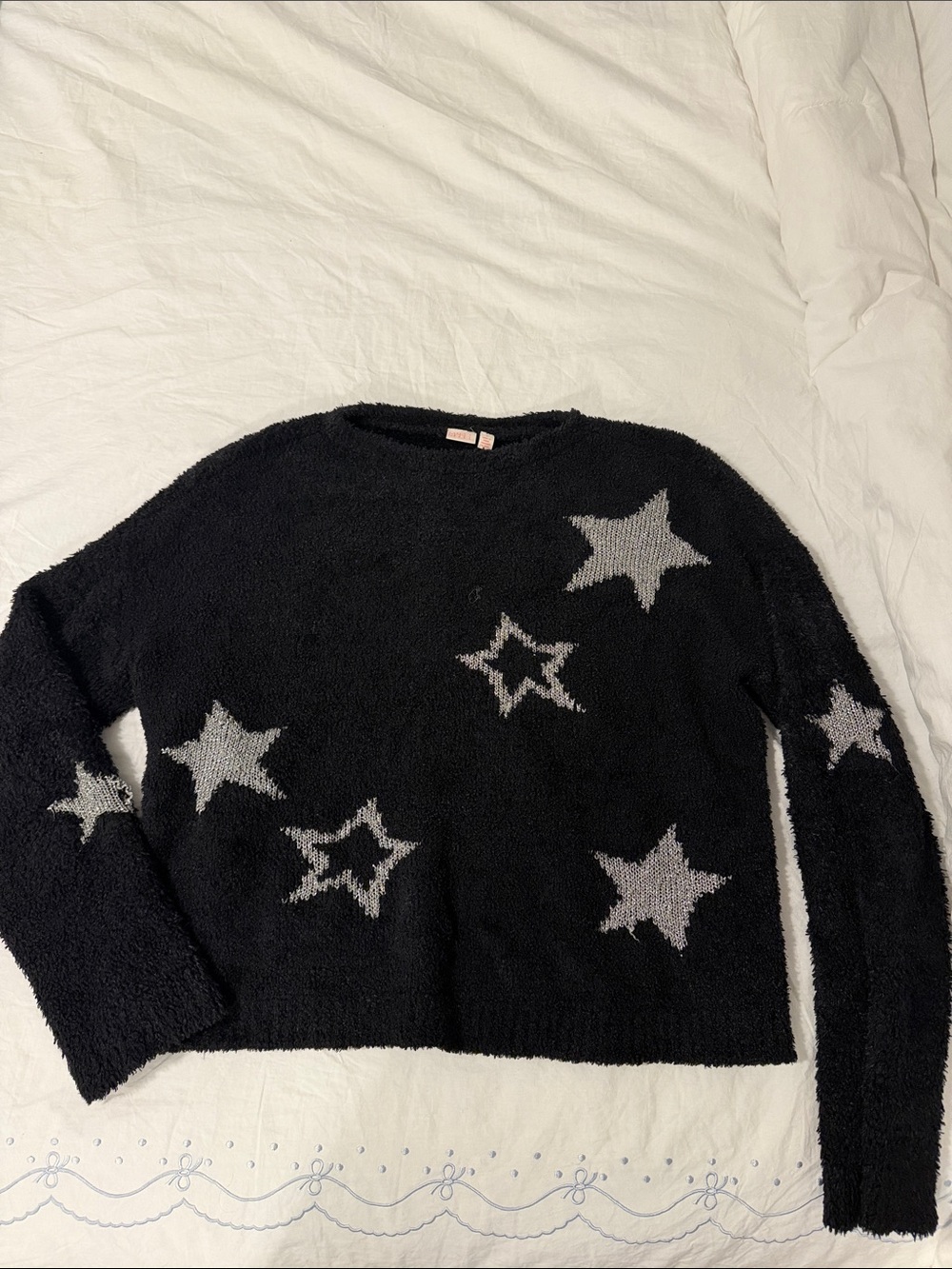 Make + Model Black Sweater with Gray Star Accents